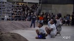 Young rodeo-goers watching at one end of the arena at Portland's first Eight Seconds Juneteenth Rodeo, June 17, 2023.