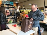 An unidentified customer at Northeast Portland's Alberta Co-op Grocery who packed his own reusable bag.