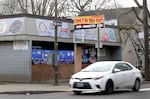 The Stop N Go Mini Mart seen boarded up on March 7, 2025. Oregon Liquor and Cannabis Commission officials issued an emergency suspension to the stop on March 21, immediately halting its beer and wine sales.