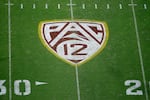 Will the Pac-12 logo, shown at Sun Devil Stadium in this Aug. 29, 2019 file photo, become a relic from the past? With the departure of several teams to other conferences, the storied conference now has only four colleges left in the fold.