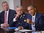 After Michael Brown's death, former President Obama — seen here with former Philadelphia police commissioner Charles Ramsey, center, and former New York City Mayor Bill De Blasio — convened a task force to address policing in the country. Ramsey co-chaired the task force and told NPR he found the variety of voices brought together to be remarkable.