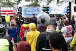 Locals rally against Trump's potential redevelopment of East Potomac Park at a protest in early October. Runners, cyclists, birders and more worry they will lose access to the space under Trump's plan to overhaul the municipal golf course there will