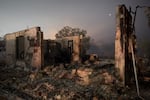 The ruins of a home that burned in the Valley Fire are seen on Sept. 15, 2015, in Middletown, Calif.