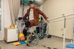 Oleksandr Budko tries to ride a unicycle at the Recovery rehabilitation center in Kyiv, Ukraine, on Oct. 18. He goes to rehabilitation centers to share the information on the process of his recovery, logistics to obtain prosthetics and about the possibilities for injured veterans.