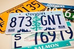 Oregon license plates are at the center of a legal battle over the state's sanctuary protections and federal immigration enforcement efforts.