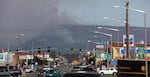 FILE - Smoke from the Taylor Bridge wildfire rises east of Cle Elum, Wash. That 2012 wildfire burned many homes between Cle Elum and Ellensburg.