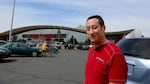 Hong Phat Food Center worker Chai Saeliew watched the protest from the store's parking lot. He's disappointed that the parade was canceled.