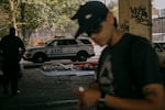 NYPD officers briefly stop by the campsite to notify residents that they will be returning in the coming days with members of a nonprofit that intends to help find them adequate shelter.