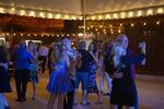 All ages dance to the Canadian Ukrainian band Klooch under the lights in the balmy summer night air.