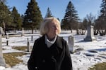 Darla Gebhard walks through the New Ulm City Cemetery, where many settlers who died in the U.S.-Dakota wars are buried.