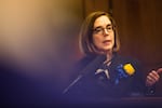 Oregon Gov. Kate Brown speaks to reporters in her ceremonial office at the Capitol in Salem, Ore., Monday, Jan. 14, 2019.