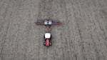 In this aerial view, Dan Duffy uses a tractor to plant soybeans on land he farms with his brother on April 28, 2025 near Dwight, Illinois.