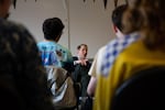 U.S. Sen. Ron Wyden, D-Ore., speaks with high school seniors at Madison High School in Portland, Ore., Thursday, March 21, 2019.