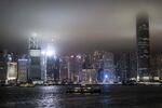 A view of the Hong Kong skyline is pictured before the lights were turned off to mark the Earth Hour environmental campaign on March 25, 2023.