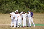 The Portland Spartans break huddle at midfield. Through things like kids camps and other forms of community outreach, many OCL players and clubs hope to deepen Oregon's connection to cricket.