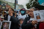 People who gathered in Poza Rico last month brought with them posters, T-shirts and jewelry bearing the images of their missing loved ones.