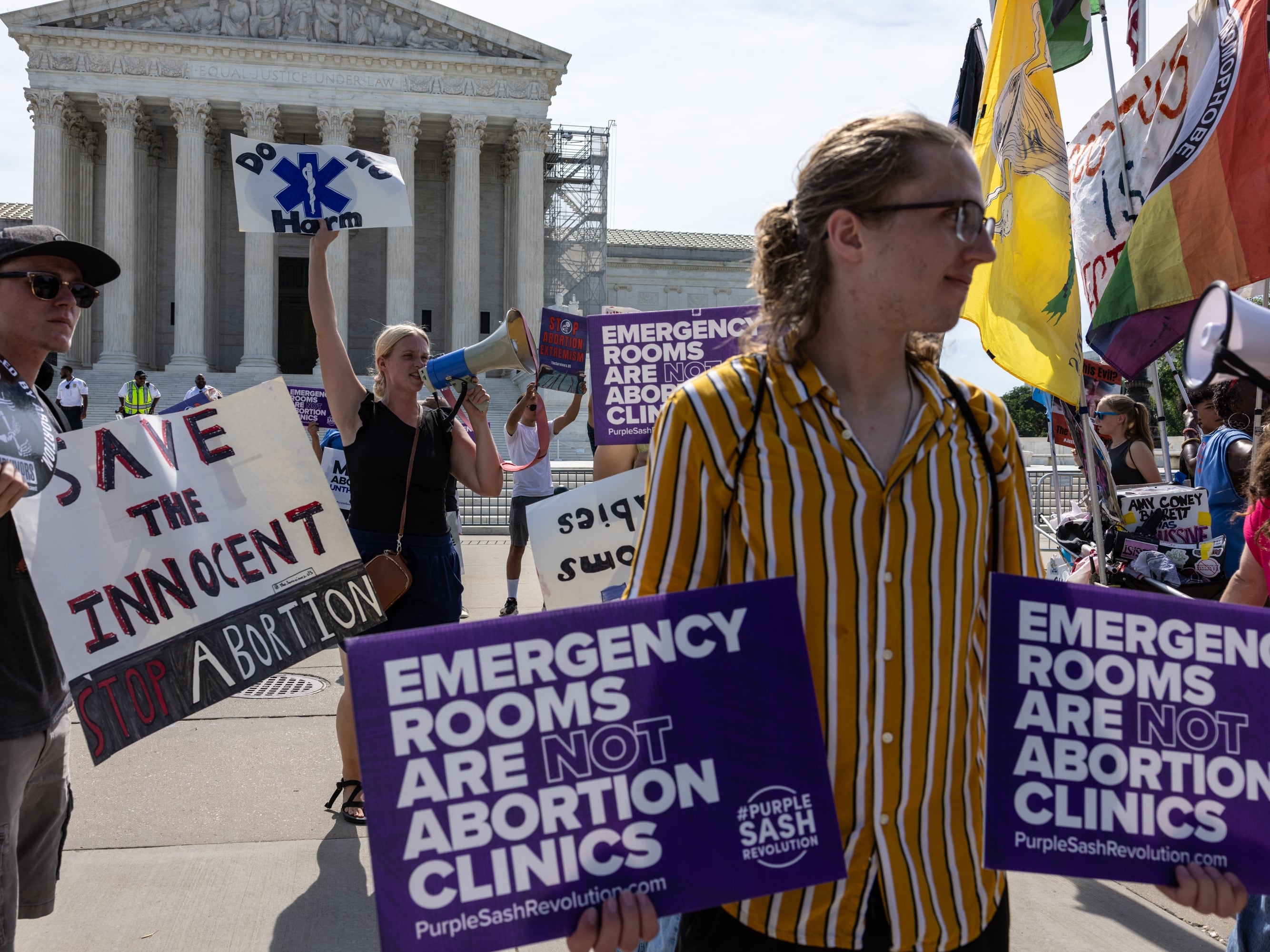 Anti-abortion demonstrators gather in front of the Supreme Court on Wednesday, the day a copy of the Idaho ruling was accidentally posted to the court's website. 