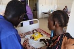 A child is treated for malnutrition at Rifa's Hostpital, in Gezira state, Sudan, on Oct. 9, 2023.