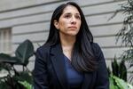 Anam Petit, a former Justice Department employee, poses for a portrait in the Robert and Arlene Kogod Courtyard at the National Portrait Gallery in Washington, Friday, Jan. 9, 2026.