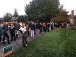 People in line, waiting to check in and vote in the Montavilla Neighborhood Association board election.
