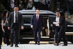 FILE - Former South Korean President Yoon Suk Yeol, center arrives at a court to attend a hearing to review his arrest warrant requested by special prosecutors in Seoul, South Korea, July 9, 2025.