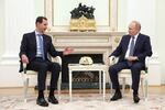 Assad speaks with Russian President Vladimir Putin during their meeting in Moscow in July. Russia has backed Syria for decades and maintained naval and air bases in the country. Assad's ouster is seen as a major setback for Russia in the Middle East.