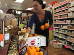 Shey Samson, manager of Melvin’s First Street Market in Sisters, has a lot of extra produce after stocking up for eclipse visitors that never came.