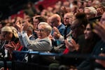 Oregon Gov. Tina Kotek claps during a public appearance in June. Kotek, who is seeking reelection, won the nomination of the Oregon Working Families Party this week.