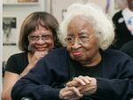 Civil rights activist Marilyn Luper Hildreth (left) and her mother, Clara Luper watch the inauguration ceremony of former President Barack Obama from the NAACP Freedom Center in Oklahoma City in January 2009.