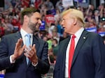 Former President Donald Trump and Republican vice presidential candidate Sen. JD Vance, R-Ohio, arrive a campaign rally on Saturday in Grand Rapids, Mich. 