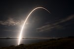 An undated photo shows a SpaceX Falcon 9 rocket carrying Starlink communication satellites into orbit. The Starlink constellation is made up of thousands of satellites that are difficult for adversaries to target.