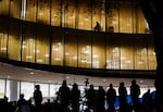 A small crowd stands outside the occupied Branford Price Millar Library at Portland State University, April 30, 2024. Many students reported not feeling safe on campus after the Spring protests.