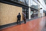 Downtown Portland businesses ready their storefronts for the expected large-scale protests, Jan. 20, 2017.