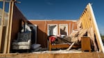 A person walks through a house in the community of Sunshine Hills outside of London, Kentucky. A tornado struck the neighborhood of Sunshine Hills just after midnight on May 17, 2025 in London, Kentucky. (Photo by Michael Swensen/Getty Images)