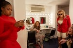 Miss Nigeria, Alexandra Etim (left to right); Miss South Africa, Chedino Rodriguez Martin; Miss France, Kevhoney Scarlett; and Miss Argentina, Lucila Thompson, relax in the dressing room they share backstage at the Rhoda McGaw Theatre on the first day of the Miss Trans Global pageant.