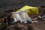 Survivors of the devastating earthquake shelter in tents and receive humanitarian aid in Imi N'Tala, Morocco, on Sept. 14.