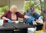 Lisa Levsen, left, serves on Sept. 27.