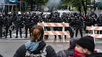 Portland police used tear gas and rubber bullets to disperse protesters from near the Justice Center an hour before the 8pm curfew went into effect on May 30, 2020. The protests were against racist violence and police brutality in the wake of the Minneapolis police killing of George Floyd.