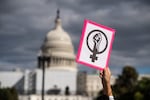 An abortion rights demonstrator holds a sign near the U.S. Capitol during the annual Women's March to support Women's Rights in Washington, D.C.