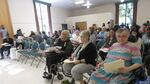 About 100 people converged on the St. Johns Community Center Saturday to talk about how best to spend tax increment funding on affordable housing.