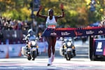 Hellen Obiri of Kenya reacts while crossing the finish line after winning the Professional Women’s Open Division during the 2025 TCS New York City Marathon on Nov. 02, 2025 in New York City.