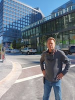 Kenny Mallick at a job site in Virginia. Mallick says he is retiring after three decades in construction, largely over frustration with the "broken labor system" that keeps the industry going.