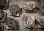 This July 18, 2019 photo shows samples of foie gras delicacy from ducks farmed at Hudson Valley Foie Gras duck farm in Ferndale, N.Y.