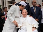 The Grand Imam Nasaruddin Umar (left) bids farewell to Pope Francis, as he leaves after signing the "Joint Declaration of Istiqlal 2024" at the Istiqlal Mosque in Jakarta, Thursday.