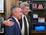 Multnomah County prosecutor Nathan Vasquez, left, is congratulated by Portland City Commissioner Rene Gonzalez at the Hoxton Hotel in Portland, Ore., May 21, 2024. 