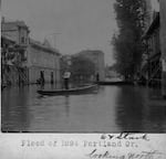 This image from 1894, shows people using boats to travel on Portland's Sixth and Stark streets.