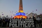 Activists and relatives of prisoners release balloons calling for the freedom of political prisoners, in Caracas, Venezuela, April 14.