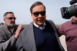 Former U.S. Rep. George Santos arrives at federal court for sentencing, Friday, April 25, 2025, in Central Islip, N.Y.