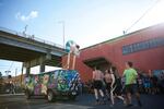 A bicyclist watches a game of Rigsketball from the Hawthorne Bridge.