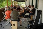 An impromptu jam session by members of the cancer camp guitar club during the 2025 "Gathering of the Wolves" annual retreat.